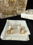 CD logo pearl stud earrings