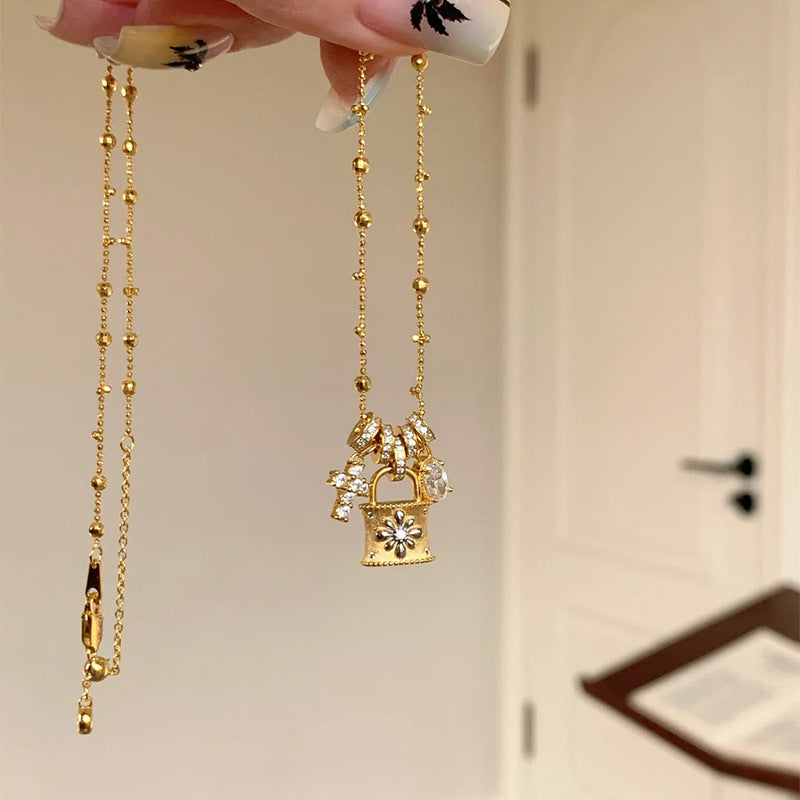 Elegant Cross & Lock Pendant Necklace – Dainty Gold Chain with Crystal Charms