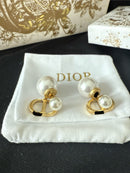 CD logo pearl stud earrings