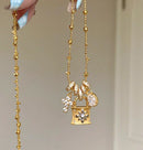 Elegant Cross & Lock Pendant Necklace – Dainty Gold Chain with Crystal Charms
